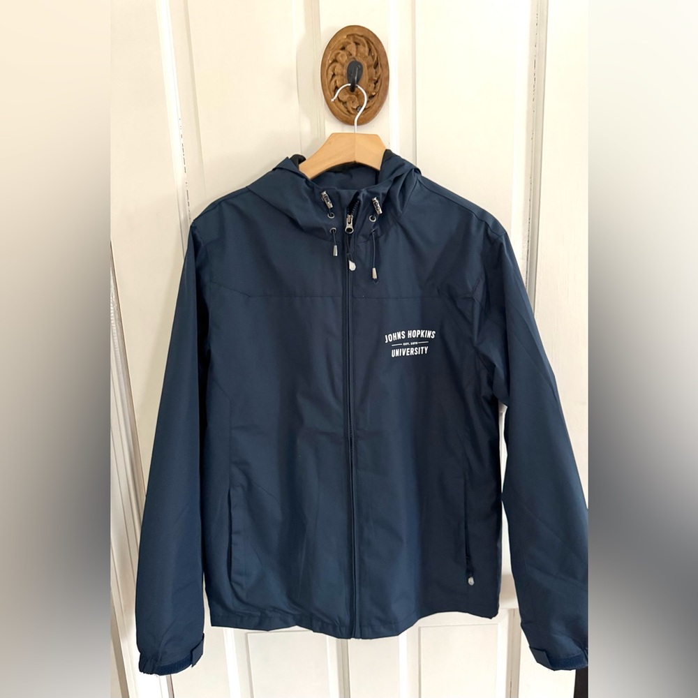 Johns Hopkins University Unisex Windbreaker. Brand new size S